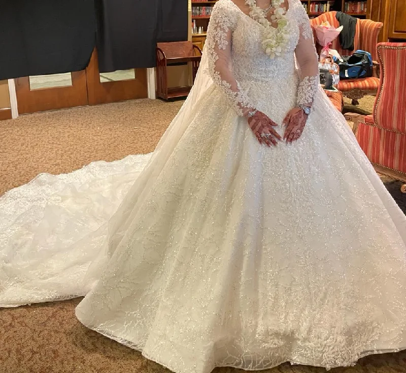 Get More, Spend Less – Shop Now!Alma Novia Beaded Long Sleeved Ball Gown NS3926